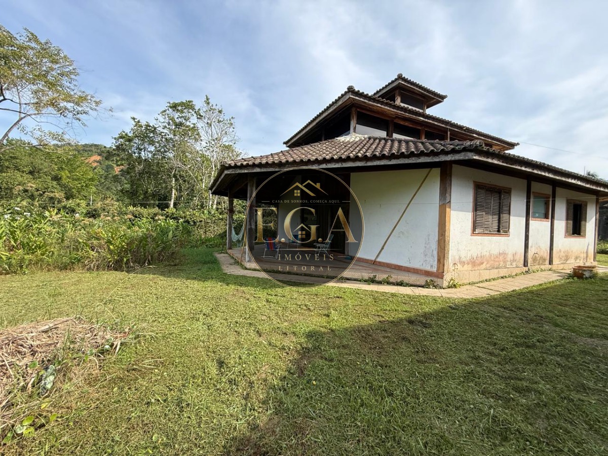 Área com 4,800m² com 07 casas a terminar camburi -sp