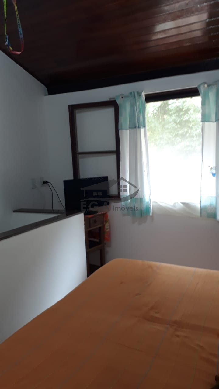 Casa em condomínio em boiçucanga