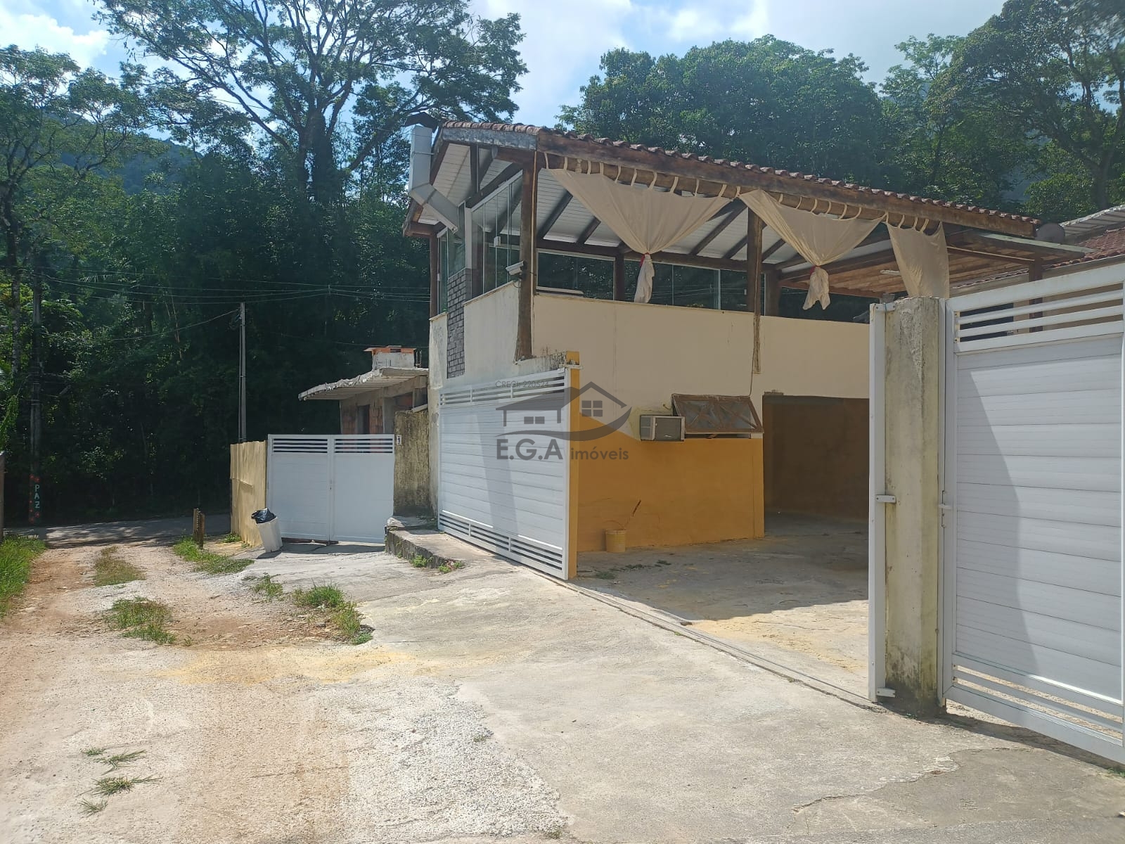 Casa de praia em boiçucanga, na beira rio