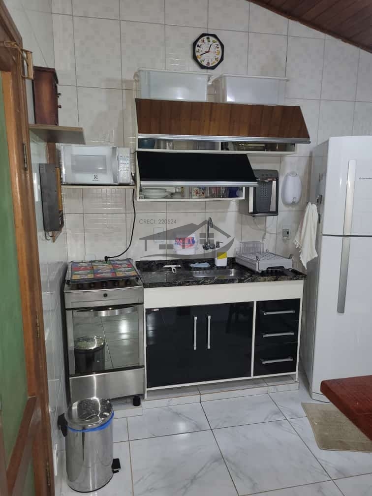Casa em condomínio praia de boiçucanga