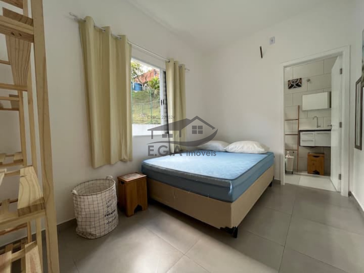Casa de condomínio em boiçucanga