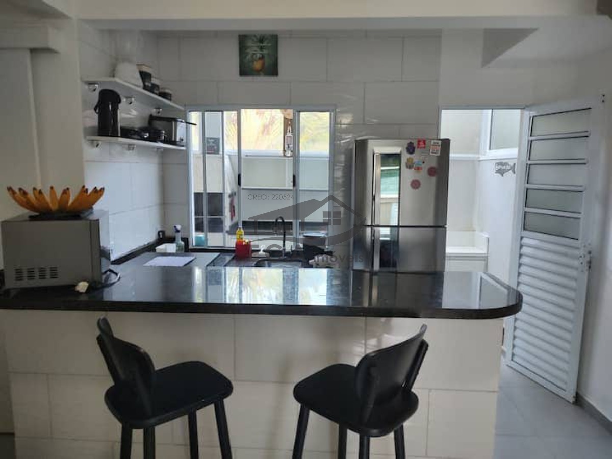 Casa de condomínio em boiçucanga